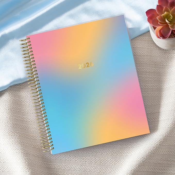 Blue Sky Livewell 2026 Weekly and Monthly Planner Calendar, January 2026 - December 2026, 7" x 9", Flexible Laminated Cover, Heavy Duty Coil Binding, Colorful Premium Paper, Includes Storage Pocket, Stickers, Beck